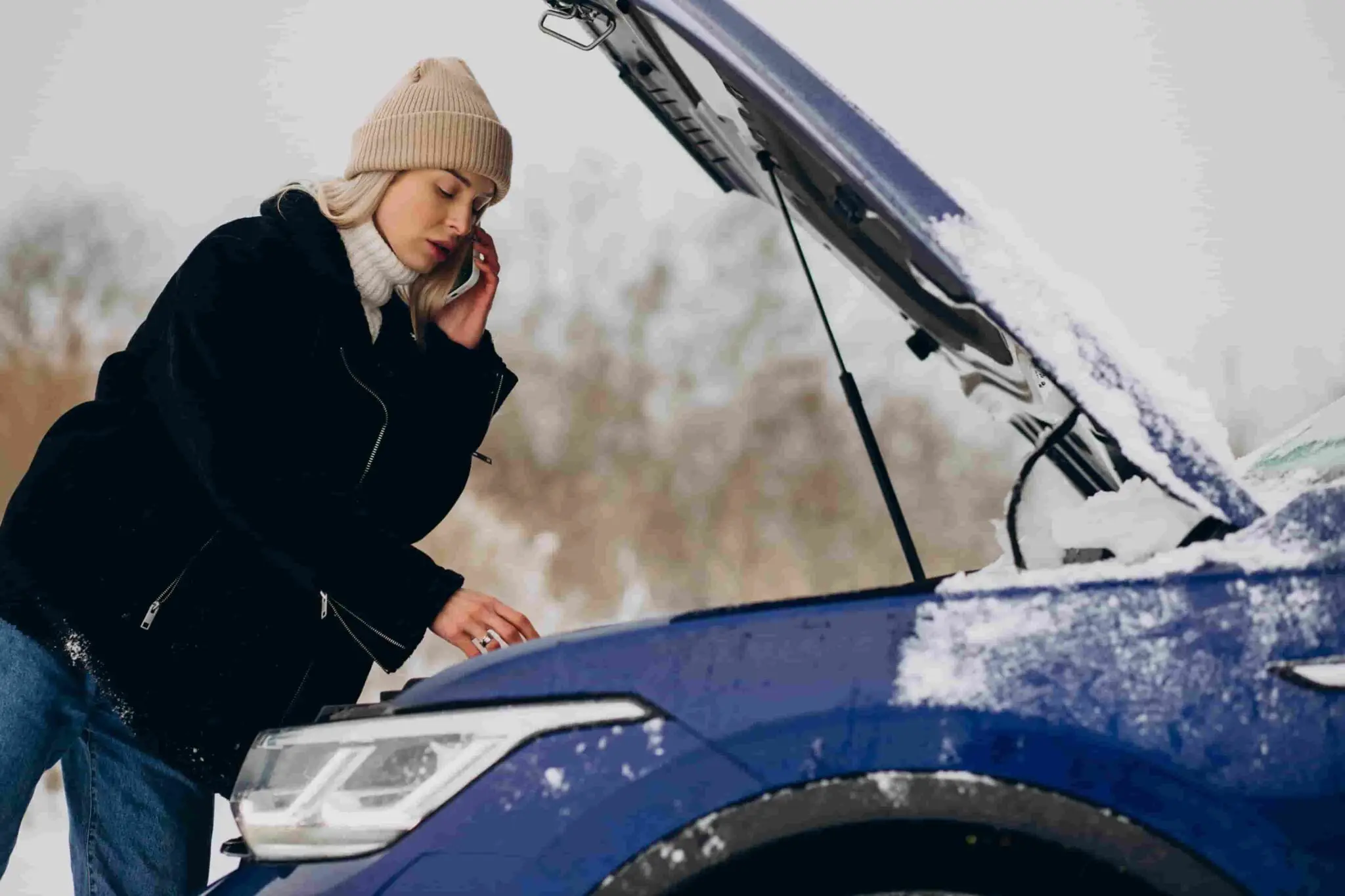 Young Woman Calling Phone After Her Car Brokedown Winter Season